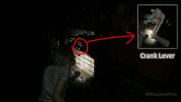 The player finds a Crank Lever hidden in a dark, narrow space between shelves.