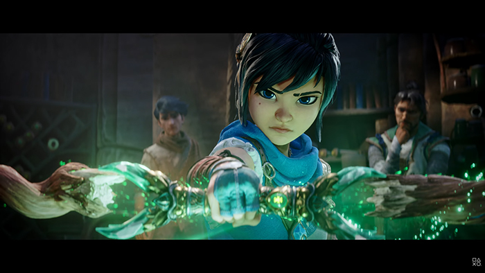 Kena, a young spirit guide with dark hair tied in a bun, holds a glowing staff charged with green elemental energy. Her expression is focused and determined as she prepares for battle.