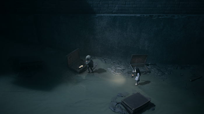 The boy and girl search scattered crates in a dimly lit room.