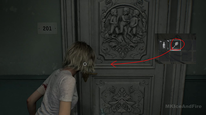 Grace using the Cherub Key to unlock Room 201 door with cherub carving