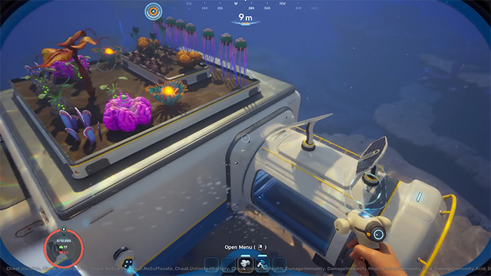 A close-up of a base module’s rooftop garden, featuring vibrant alien plants in purple, orange, and yellow hues growing in soil. The roof has a transparent dome section and a solar panel attached. A player's hand holds a tool near the edge, with an on-screen prompt reading “Open Menu.”