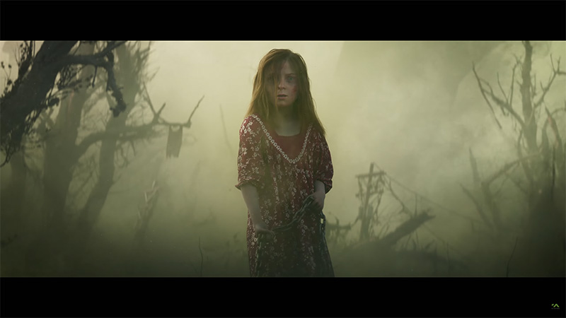 A young girl with dirt-streaked face and tattered floral dress stands alone in a fog-choked ruined forest, gripping a heavy iron chain her expression weary yet resolute.