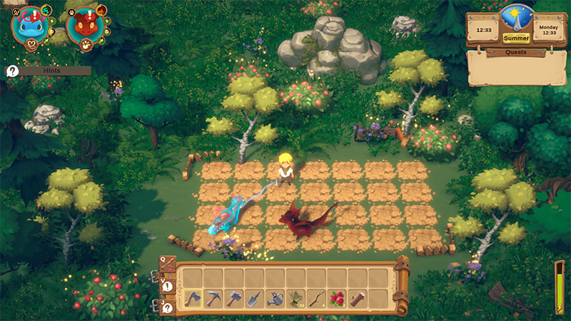The player tends a tilled farm plot with a blue dragon nearby and a red dragon resting on the soil; lush forest surrounds the field, with berry bushes and stone outcrops visible. UI shows time (12:33), season (Summer), day (Monday), and hint icons for two dragons.