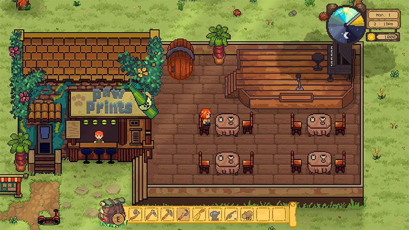 Inside the “Paw Prints” café, the player stands behind the counter. Four empty tables with chairs are arranged in the seating area. A stage and barrel are visible in the background.