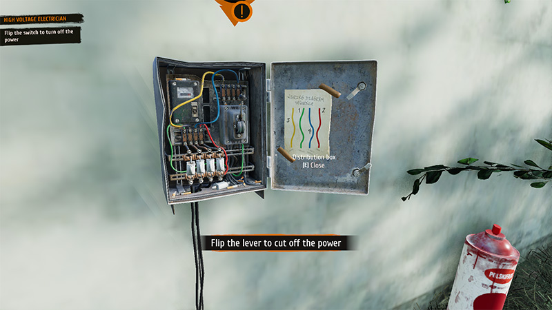 An open metal distribution box with exposed wiring, switches, and fuses; a handwritten schematic is taped to the inside door.