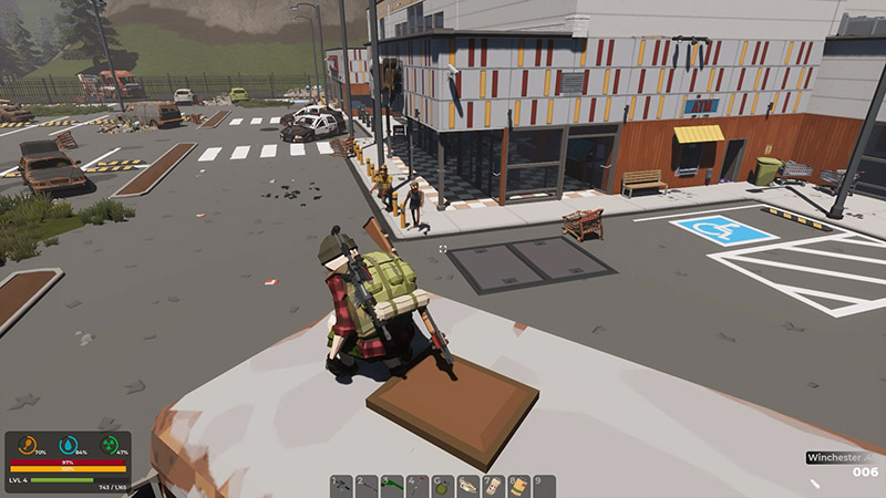 A survivor crouches on the roof of a derelict bus, surveying a deserted street with abandoned vehicles and a modern building featuring striped panels.