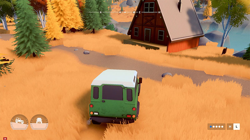 A green off-road vehicle drives through golden grass toward a rustic A-frame cabin nestled among autumn pines and birches, with a lake visible in the distance.