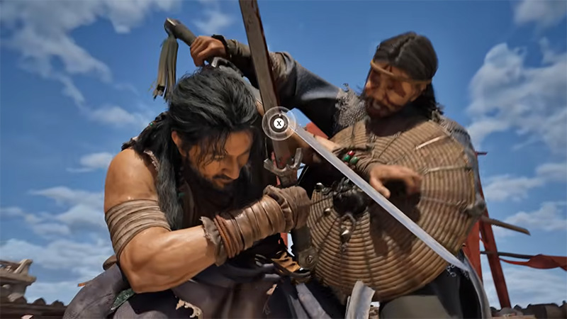 The protagonist blocks a sword strike with both hands, while the enemy—headscarf, long blade—attacks; an on-screen “X” prompt appears at the center, against a clear blue sky.