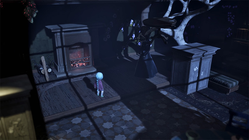 A small child with light blue hair and a purple coat stands facing a tall figure in a long black dress inside a dimly lit room. A fireplace glows nearby, casting shadows across the bare wooden floor.