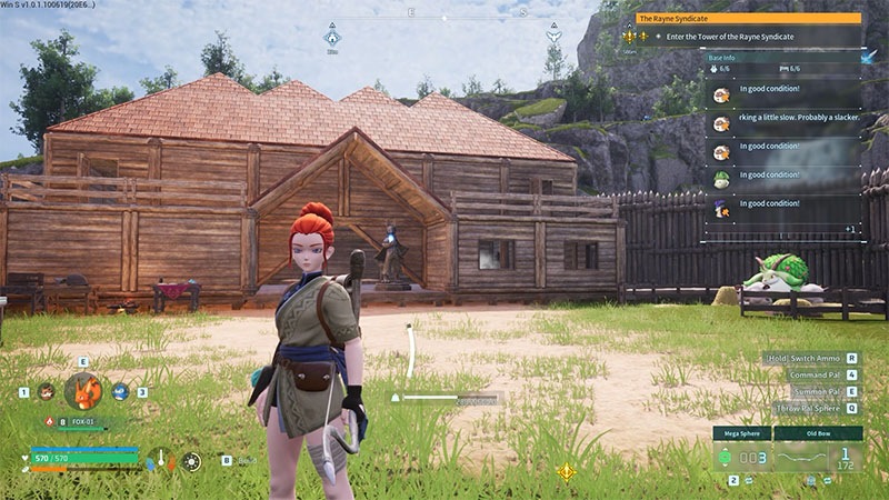 A red-haired character stands with back to camera on grass, facing a wooden house with a tiled roof and enclosed by a wooden fence; inside the yard are a workbench, bench, and a bed occupied by a green creature, with rocky cliffs and trees in the background.