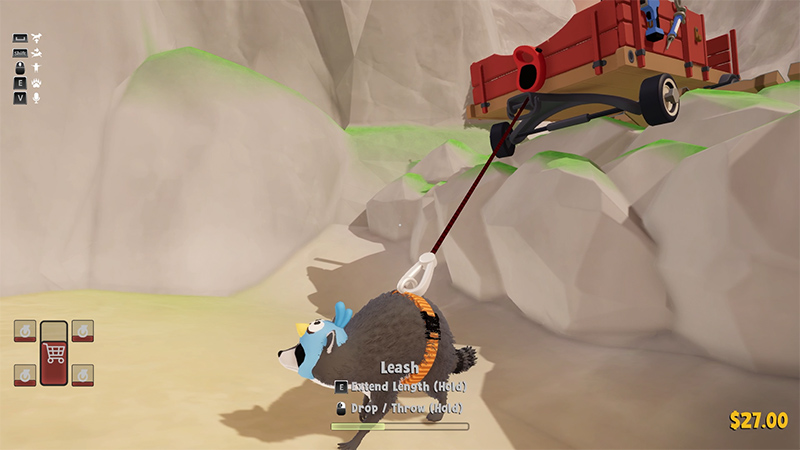 A raccoon pulls a red wagon stuck on a rocky incline using a leash, in a desert canyon setting.