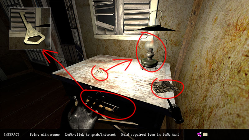 Table with matches, an oil lamp, and a photo clue, with the open drawer containing a key